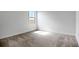 Bedroom with neutral carpet, white walls and window at 196 Eagleston Ln, Lakewood Ranch, FL 34240