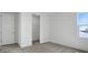 Bedroom with neutral carpet, white walls and closet at 196 Eagleston Ln, Lakewood Ranch, FL 34240