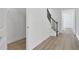 Hallway with a coat closet and staircase with railing at 196 Eagleston Ln, Lakewood Ranch, FL 34240