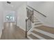 Hallway with a staircase and railing at 196 Eagleston Ln, Lakewood Ranch, FL 34240