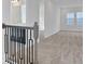 Upstairs hall with carpet and windows at 196 Eagleston Ln, Lakewood Ranch, FL 34240