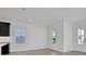 A living room featuring plenty of bright light from the windows at 196 Eagleston Ln, Lakewood Ranch, FL 34240