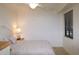 Bright bedroom featuring a ceiling fan, neutral tones, and a window with natural light at 7005 River Hammock Dr # 207, Bradenton, FL 34212