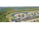 Beautiful condo with golf course view, assigned parking, and lush landscaping at 7005 River Hammock Dr # 207, Bradenton, FL 34212