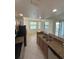 Well-equipped kitchen with granite countertops, and a cozy breakfast nook with picturesque lake views at 7005 River Hammock Dr # 207, Bradenton, FL 34212