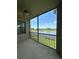 Relaxing screened lanai overlooking a serene lake at 7005 River Hammock Dr # 207, Bradenton, FL 34212