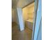 Convenient laundry room with a white washer and dryer at 7005 River Hammock Dr # 207, Bradenton, FL 34212