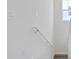 Bright white walls and a white staircase lead to the upper floors with a window providing natural light at 9015 Rothman Ln, Lakewood Ranch, FL 34240