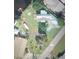 Detailed aerial view showcasing property lines, house dimensions and adjacent lots at 3427 Minnow Creek Dr, Hernando Beach, FL 34607