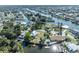 Aerial view showing the waterfront homes along canals, creating a coastal neighborhood at 3427 Minnow Creek Dr, Hernando Beach, FL 34607