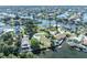 An aerial perspective highlighting waterfront properties with canals, illustrating the coastal community's charm at 3427 Minnow Creek Dr, Hernando Beach, FL 34607