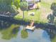 Waterfront home featuring a deck, a small dining patio, a private boat dock and beautiful canal views at 3427 Minnow Creek Dr, Hernando Beach, FL 34607