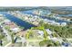 Desirable waterfront property offering canal access and picturesque neighborhood, outlined with yellow at 3427 Minnow Creek Dr, Hernando Beach, FL 34607