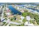 Stunning aerial view of waterfront homes nestled along canals, showcasing coastal living at its finest at 3427 Minnow Creek Dr, Hernando Beach, FL 34607