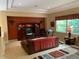 Relaxing bonus room with carpet, a media center, and a large window offering natural light at 5271 Visionary Ct, Sarasota, FL 34233