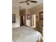 A partial view of a main bedroom leading to a walk in closet and the main bath at 5271 Visionary Ct, Sarasota, FL 34233