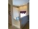 View of the staircase to the first floor reveals neutral wall color at 5271 Visionary Ct, Sarasota, FL 34233