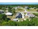 Bright aerial view showcases this single Gathering home with lush surroundings and long driveway at 3708 Alafia Creek St, Plant City, FL 33567