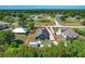 Aerial view of the property highlighting the house, shed, and outdoor space at 3708 Alafia Creek St, Plant City, FL 33567
