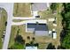 Overhead aerial perspective of a home featuring an extended driveway, large yard, and storage building at 3708 Alafia Creek St, Plant City, FL 33567