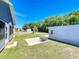 Huge backyard with a shed, mature trees, patio area and lots of green grass at 3708 Alafia Creek St, Plant City, FL 33567