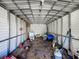Interior of shed with steel frame and metal roof panels at 3708 Alafia Creek St, Plant City, FL 33567