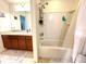 Full bathroom features a shower-tub combination and spacious vanity area at 6698 Wirevine Dr, Brooksville, FL 34602