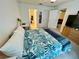 Bedroom with carpet flooring and plenty of natural light and interior entryways at 6698 Wirevine Dr, Brooksville, FL 34602