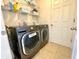 The laundry room features an LG washer and dryer set with storage shelves above at 6698 Wirevine Dr, Brooksville, FL 34602