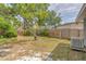 Backyard with wooden fence and grass at 5330 Dr Martin Luther King Jr St S, St Petersburg, FL 33705