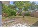 Backyard with wooden fence and grass at 5330 Dr Martin Luther King Jr St S, St Petersburg, FL 33705