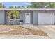 Inviting single-story home featuring a well-manicured front lawn at 5330 Dr Martin Luther King Jr St S, St Petersburg, FL 33705