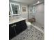 Beautiful bathroom featuring stunning tile flooring, a glass shower and a floating vanity at 33 S Gulfstream Ave # 803, Sarasota, FL 34236