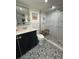 Beautiful bathroom featuring stunning tile flooring, a glass shower and a floating vanity at 33 S Gulfstream Ave # 803, Sarasota, FL 34236