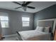 Well-lit bedroom with a queen-size bed and views of the marina at 33 S Gulfstream Ave # 803, Sarasota, FL 34236