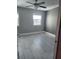 Clean, well-lit bedroom with tile flooring and a ceiling fan at 33 S Gulfstream Ave # 803, Sarasota, FL 34236