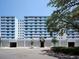 Attractive exterior elevation of a condominium building with a well-manicured entrance at 33 S Gulfstream Ave # 803, Sarasota, FL 34236
