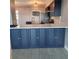 Stylish kitchen with custom cabinetry, white countertops, and stainless steel refrigerator at 33 S Gulfstream Ave # 803, Sarasota, FL 34236