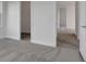 Clean bedroom with neutral carpet, white walls, and doorways leading to other rooms at 200 Eagleston Ln, Lakewood Ranch, FL 34240