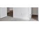 Cozy walk-in closet with neutral carpeting and ample storage space off bedroom at 200 Eagleston Ln, Lakewood Ranch, FL 34240