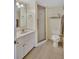 Well-maintained bathroom with a shower, vanity, and practical layout at 12300 Vonn Rd # 1102, Largo, FL 33774