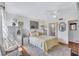 Relaxing primary bedroom featuring a comfortable bed and a tranquil ambiance at 12300 Vonn Rd # 1102, Largo, FL 33774
