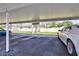 Designated covered parking area provides shade and protection from the elements for residents' vehicles at 12300 Vonn Rd # 1102, Largo, FL 33774