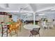 Recreation space featuring multiple tables and a pool table, providing opportunities for social gatherings and leisure at 12300 Vonn Rd # 1102, Largo, FL 33774