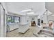 Spacious kitchen with a large island, white cabinetry, and an open layout, ideal for cooking and entertaining at 12300 Vonn Rd # 1102, Largo, FL 33774