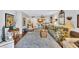 Inviting living room seamlessly blends with the adjacent kitchen area, perfect for entertaining at 12300 Vonn Rd # 1102, Largo, FL 33774