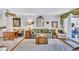 Comfortable living room with neutral decor, ideal for relaxation and casual gatherings at 12300 Vonn Rd # 1102, Largo, FL 33774