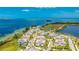 Stunning aerial view of a waterfront community with picturesque scenery at 283 Saint Lucia Dr # 101, Bradenton, FL 34209