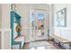 Bright entryway features stylish furnishings, light colored floors, and plenty of light at 283 Saint Lucia Dr # 101, Bradenton, FL 34209