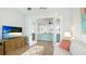Cozy living room area with decorative glass doors leading to the dining room at 283 Saint Lucia Dr # 101, Bradenton, FL 34209